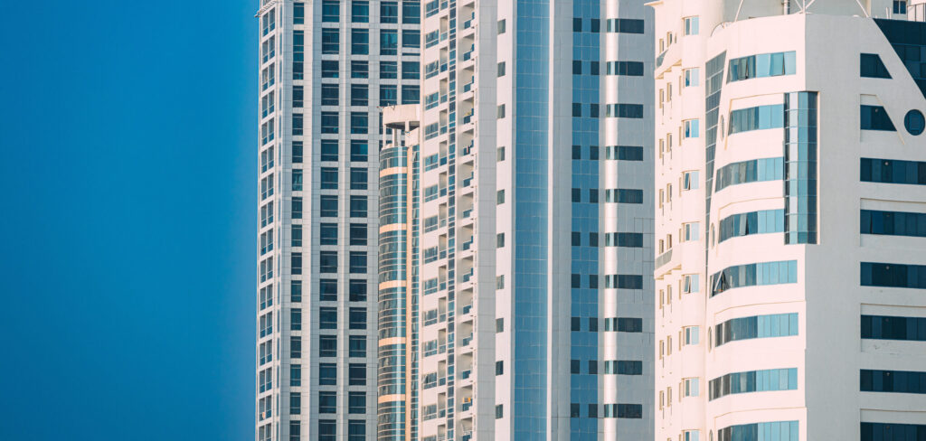 Modern commercial buildings featuring aluminum cladding in Dubai for durable and energy-efficient exterior architecture.