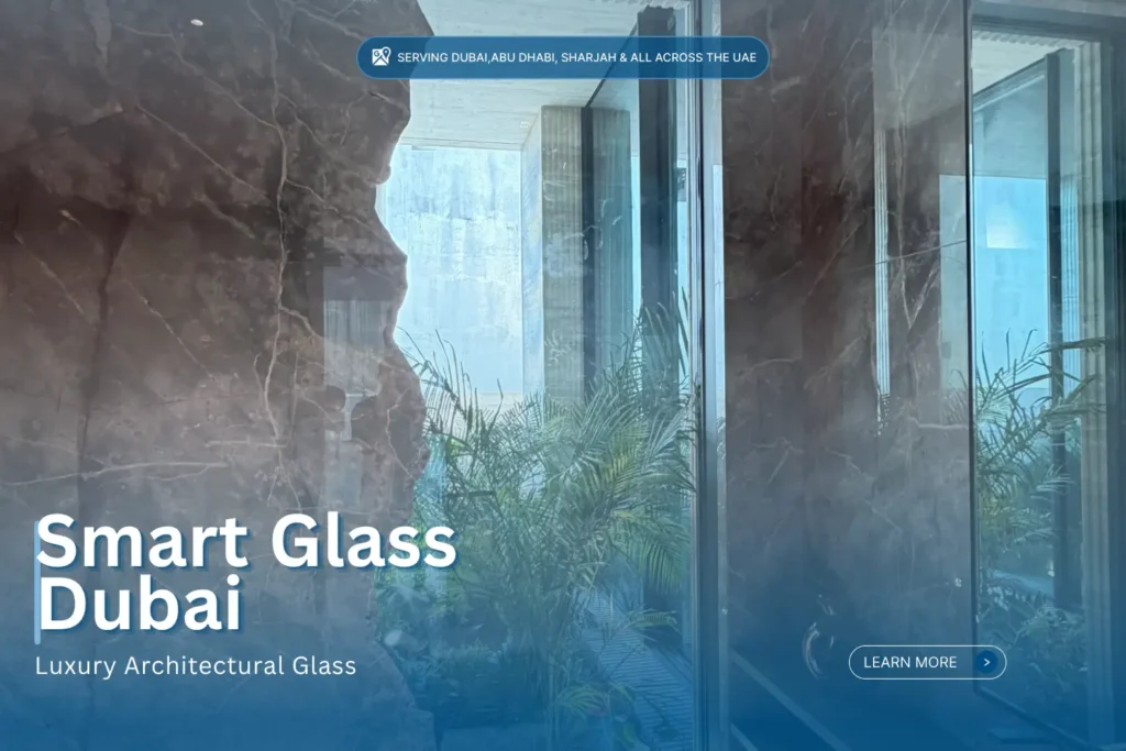 Luxury villa interior featuring floor-to-ceiling smart glass installation next to natural stone cladding in Dubai